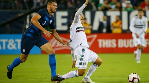 Adams off the mark as USA sink 10-man Mexico