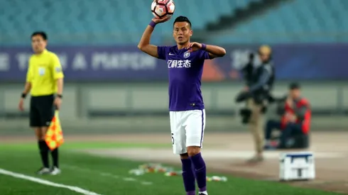 Uighur footballer chases China landmark in troubled times