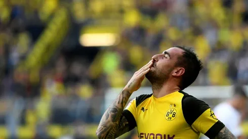 Alcacer hat-trick keeps Dortmund top after seven-goal thriller