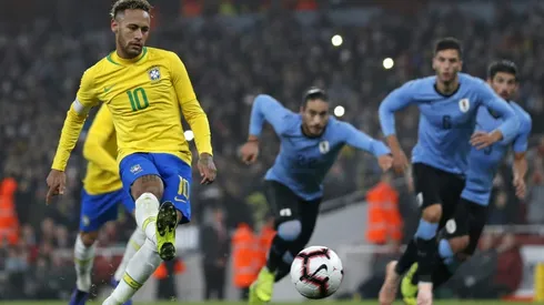 Neymar penalty punishes Uruguay in feisty friendly