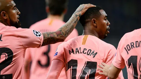 Barcelona through in Champions League as Liverpool suffer shock loss