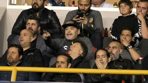 Furious Maradona hurls insults at rival fans