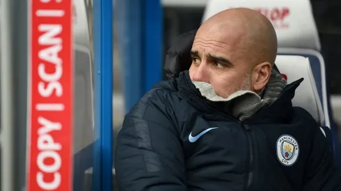 Guardiola unhappy as City keep pace with Liverpool in Huddersfield win