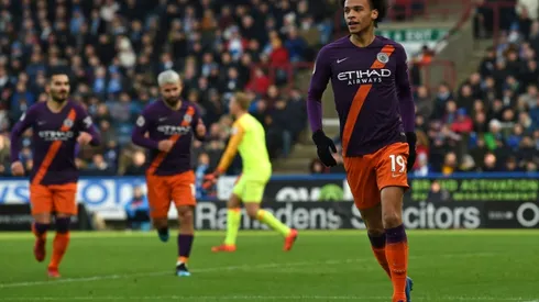 Man City ease past Huddersfield to cut Liverpool's lead