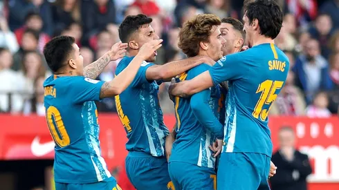 Griezmann brilliance keeps Atletico second in La Liga