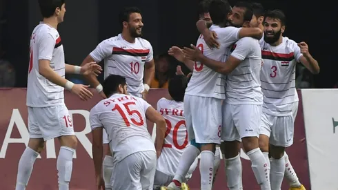 Syria take field in Asian Cup with fans divided by war
