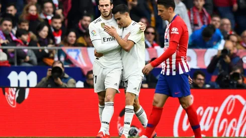 Real Madrid triumph in derby as Courtois defies 'rats' barrage