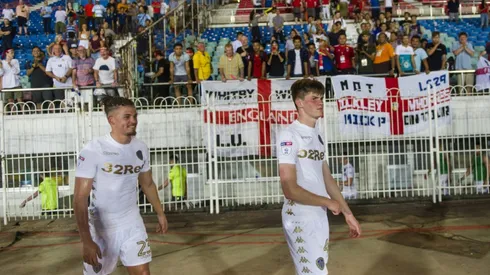 Clarke taken ill as Phillips strikes late to send Leeds top in Championship