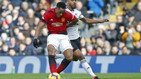 Martial gem lifts resurgent United into fourth place