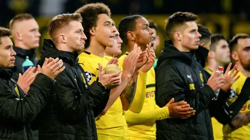Out of Europe, Dortmund must resist Bayern's title challenge