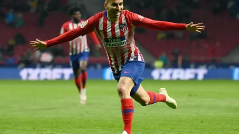 Atletico edge five-goal thriller with Valencia to delay Barca celebrations