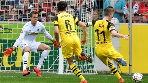 Pain gain as Reus helps Dortmund keep heat on Bayern with Freiburg win