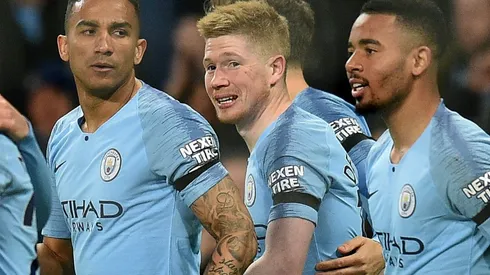 Man City back on top as Spurs party in style