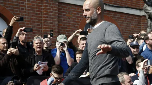 Guardiola puts quadruple talk aside