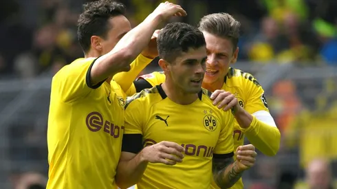 Dortmund take title race to wire as Bayern held