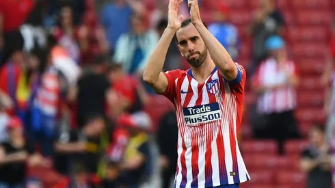 Tearful Godin confirms Atletico exit