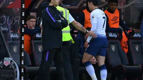 Ake strikes late to sink nine-man Spurs