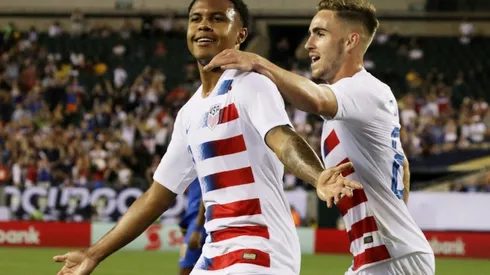USA and Jamaica win close contests to set up semi-final clash