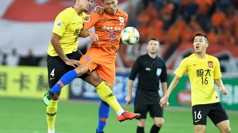 Penalty drama as Chinese giants Evergrande reach Asia's last eight