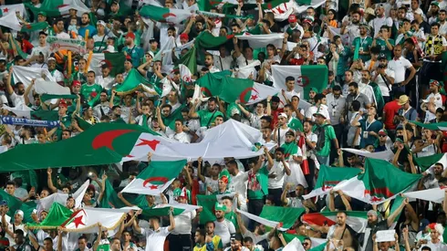 Algerian fans switch their Friday focus from politics to football