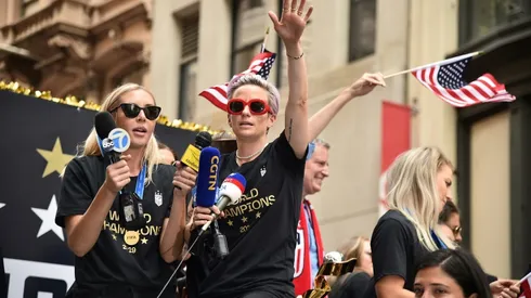 Confetti and chants of 'equal pay' greet US World Cup winners