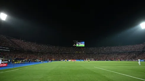 Egyptians light up stadium in tribute to fallen fans