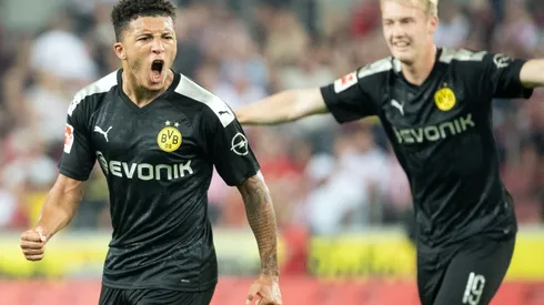 Sancho inspires Dortmund comeback against spirited Cologne