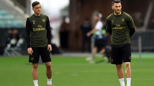 Two charged over security incident linked to Arsenal duo