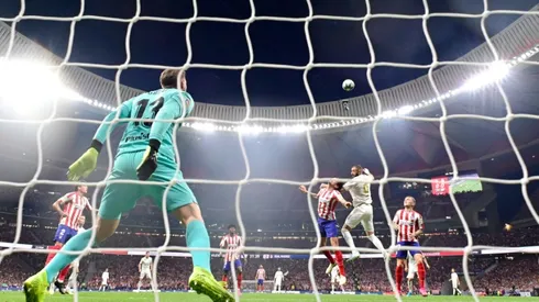 Real hold off Atletico in tight derby to grab top spot in Spain