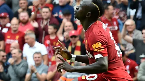 Mane, Salah combine to maintain Liverpool's perfect start