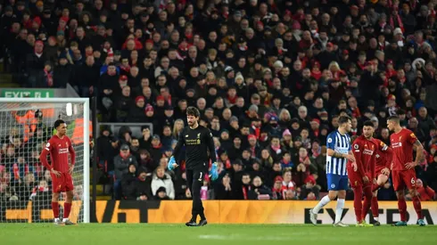 Ten-man Liverpool grateful for van Dijk double