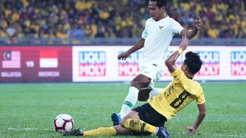 Hong Kong turn backs on anthem then cheer team to first win