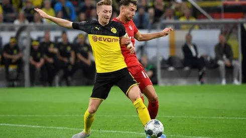 In-form Dortmund look to pile misery on embattled Bayern