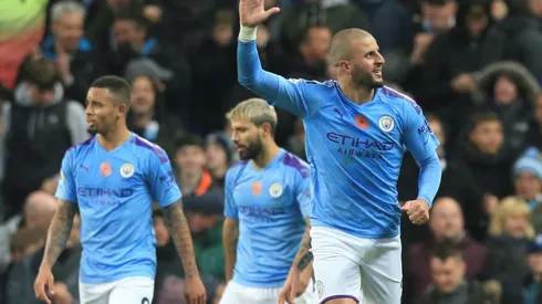 Late turnaround keeps Man City on Liverpool's tails