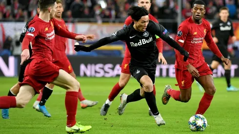 Japanese star Minamino signs for Liverpool