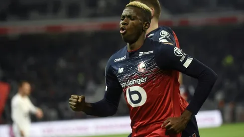 Lille up to third, Garcia's Lyon rout nine-man Nimes