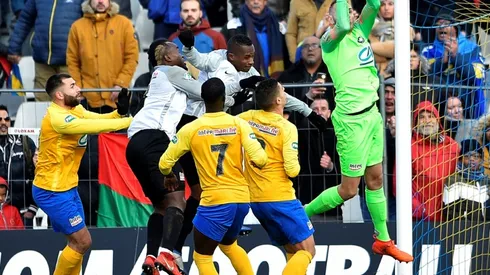 Late goal sinks 10-man Reunion islanders in French Cup