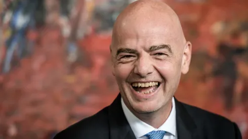 Infantino takes Blatter's empty seat at IOC