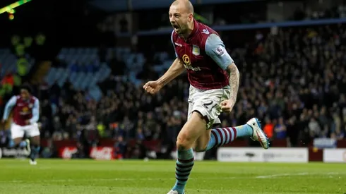 Former Villa defender Hutton retires