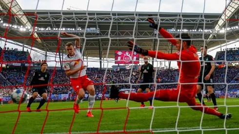 Leipzig warm up for Spurs by regaining top spot in Germany