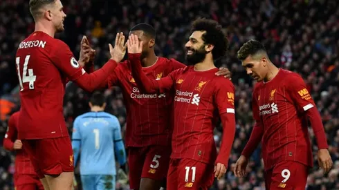 Liverpool move 22 points clear, Man Utd held on Fernandes debut