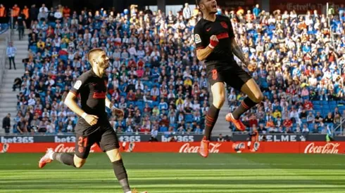 Atletico frustrated by struggling Espanyol but Sevilla snatch late win