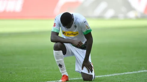 Thuram takes a knee in US killing protest as Gladbach go third