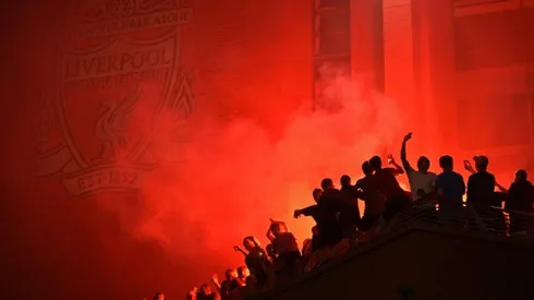 Liverpool fans ignore social distancing to celebrate Premier League title