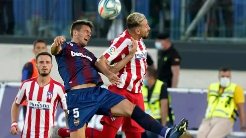 Atletico grind out Levante win to march into third