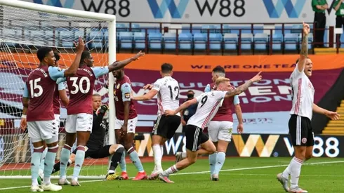 Premier League restarts with goal-line howler as players take knee