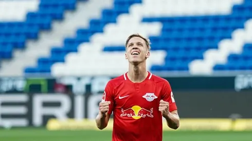 Olmo double keeps Leipzig on Champions League path