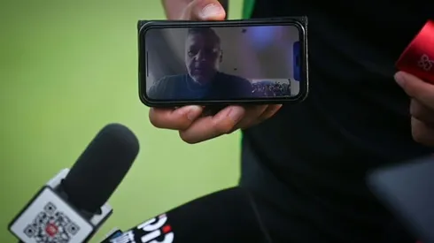 French coach gives virus-hit Beijing press conference from 8,000 kms away