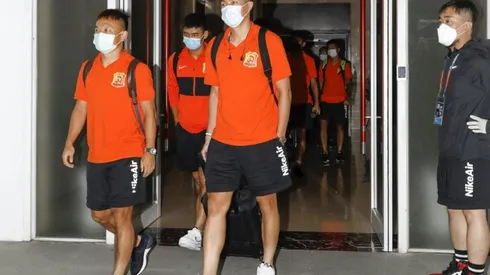 Expulsion warning as Chinese teams enter 70-day virus 'bubble'