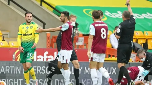 Burnley beat nine-man Norwich to keep Euro bid alive